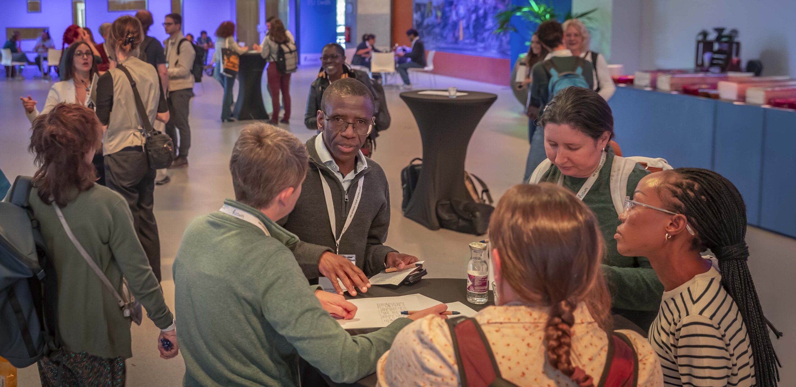 Delegates in discussion at the CS4Water Conference 2025 in Delft
